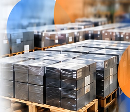 Pallets of devices in a PCS warehouse